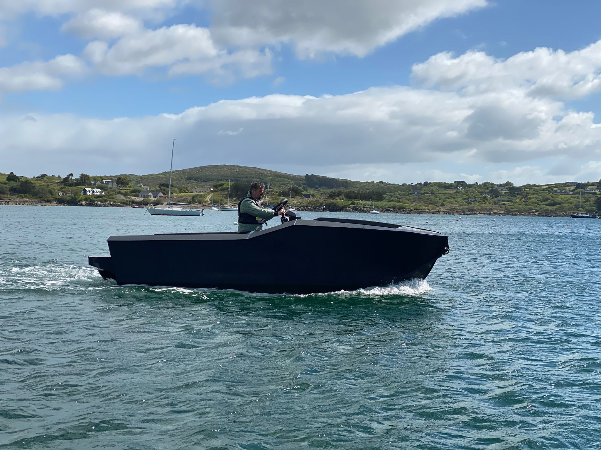 Teal Marine 5m HDPE electric boat underway, side profile